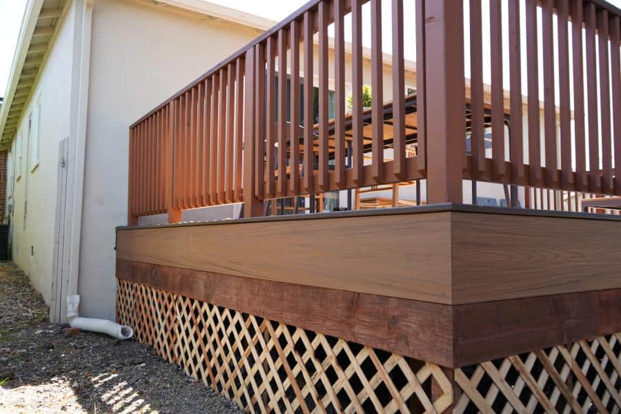 TREX deck — custom-stained spindle railing detail