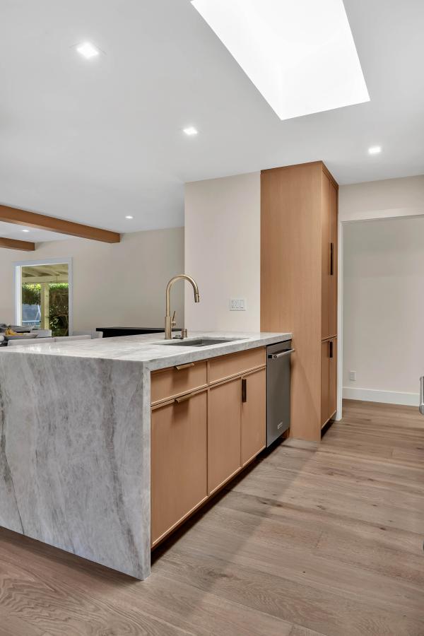 Walnut Creek kitchen — marble waterfall island and white oak cabinetry