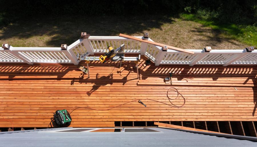 Deck rebuild — old decking removed, install underway