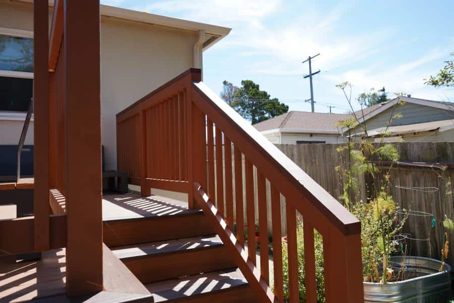 TREX deck — custom stair and spindle railing