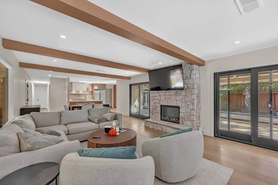 Walnut Creek living room — custom stone fireplace and exposed beams