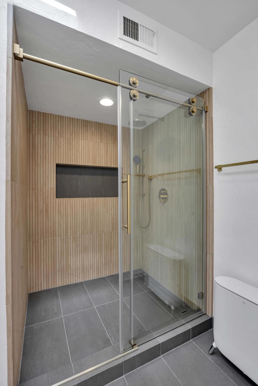 San Francisco master bathroom — walk-in shower with fluted tile