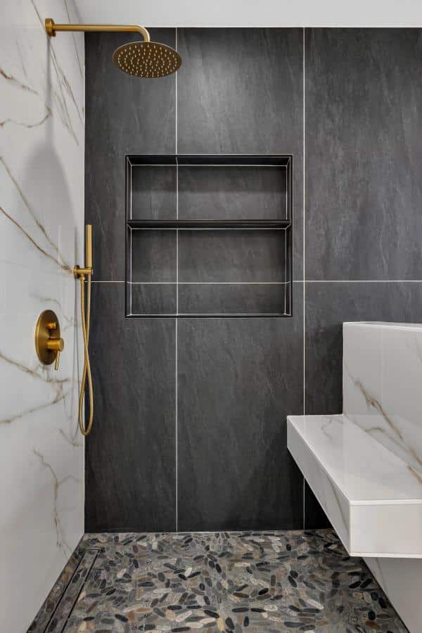 San Jose master bath — shower niche and marble half-wall