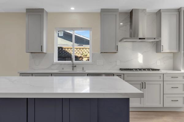San Mateo kitchen — cooktop wall and navy island
