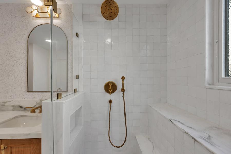 San Carlos master bath — walk-in shower with brushed gold rain head