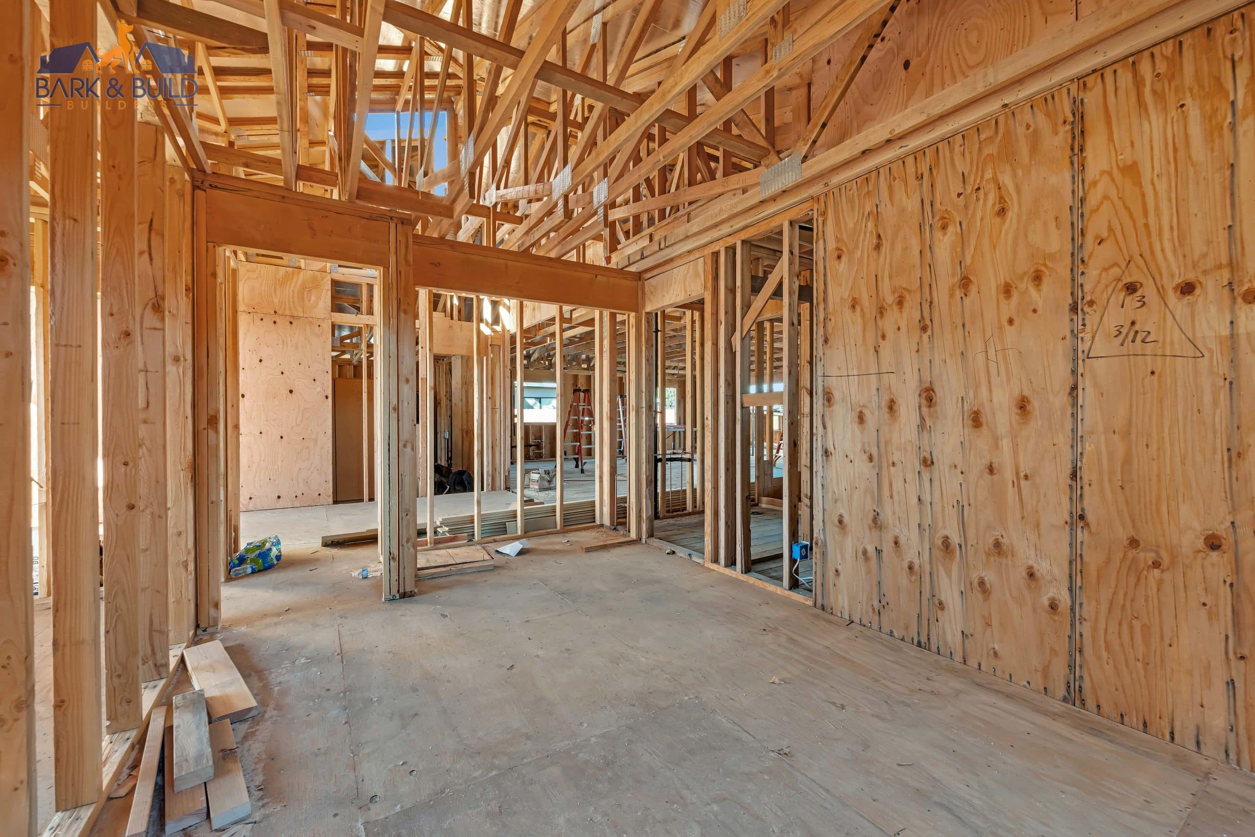 In-house crew framing a room addition tie-in