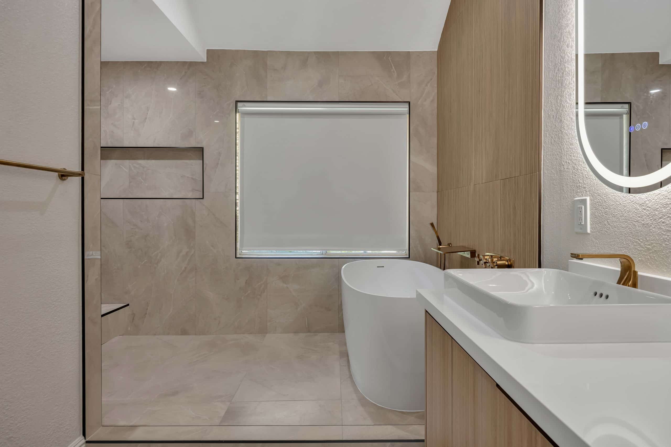 Pleasanton master bathroom remodel — walk-in shower, freestanding tub, and dual floating vanity