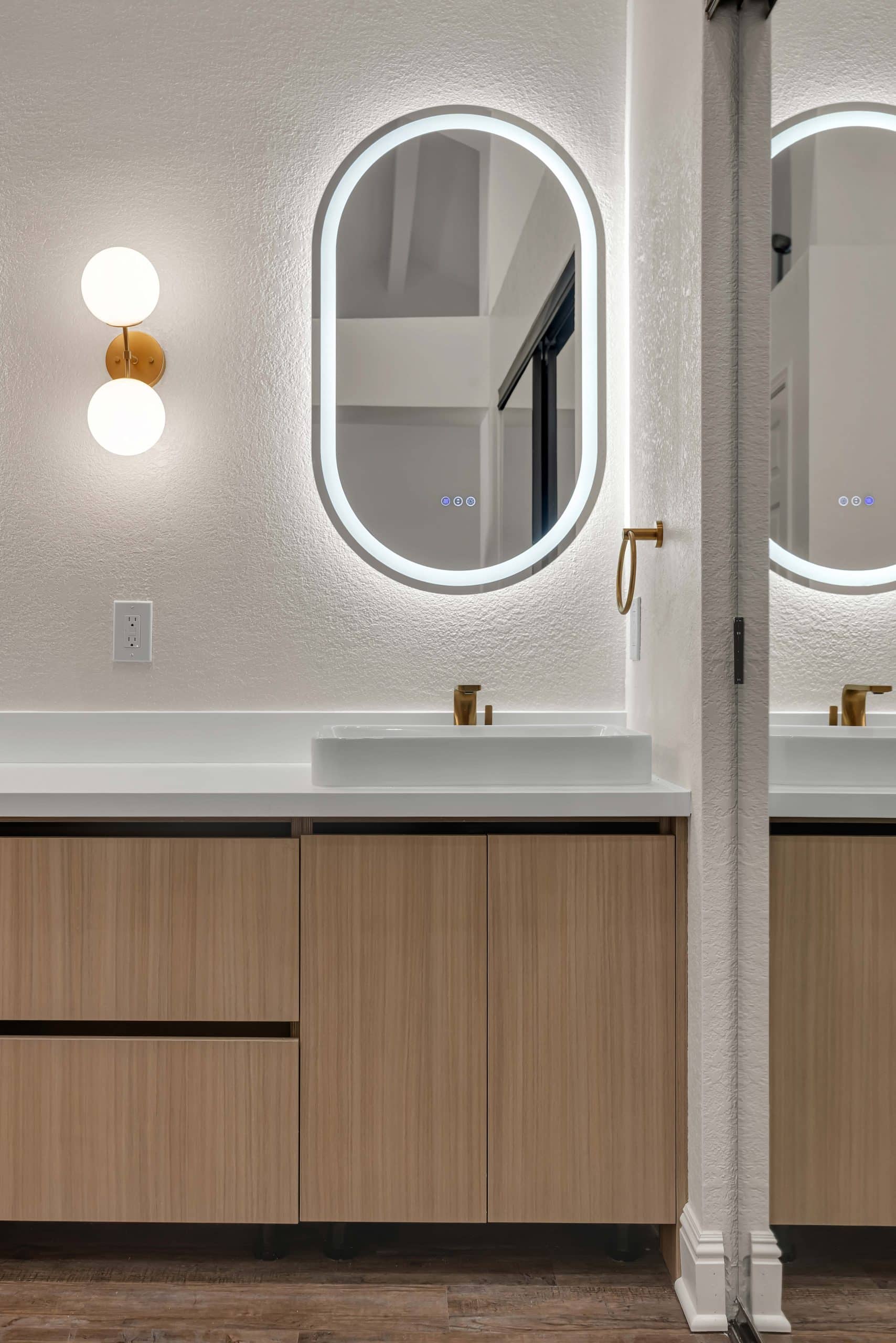 Pleasanton master bathroom — completed spa retreat with floating oak vanity and brushed-gold accents
