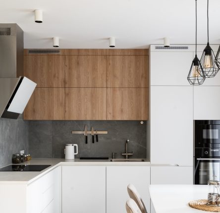 White kitchen with wood details and concrete tile